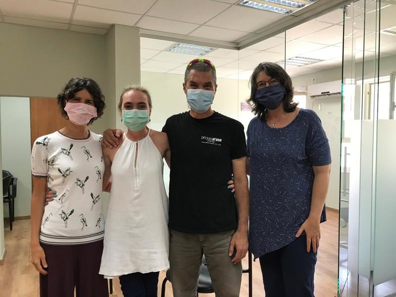 ICEJ Aid team and beneficiaries