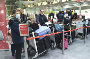 Russian Aliyah waiting for flight