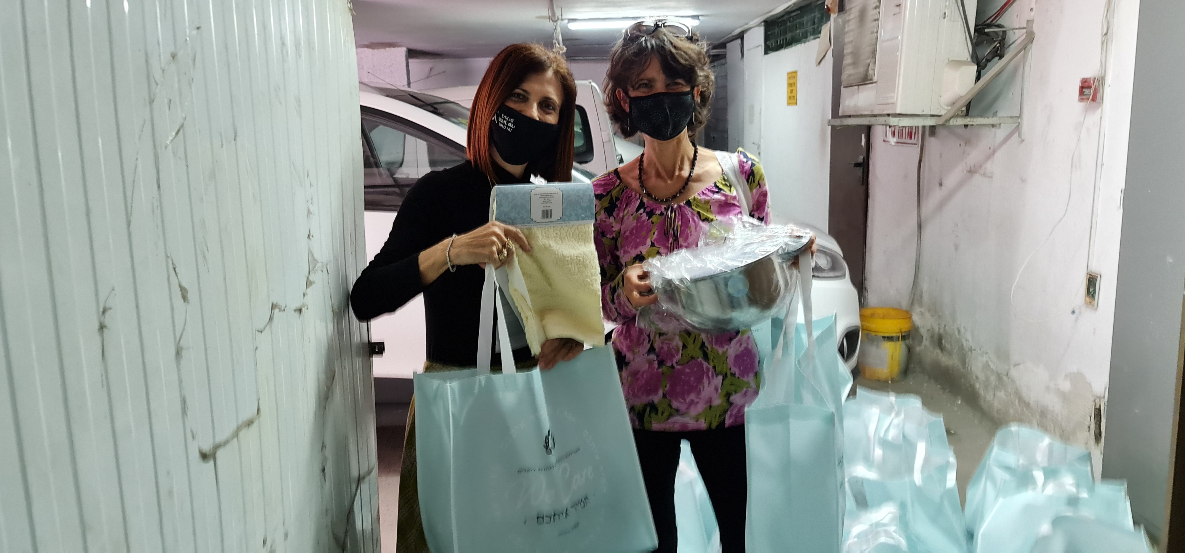 Social worker Etti receiving ICEJ gifts