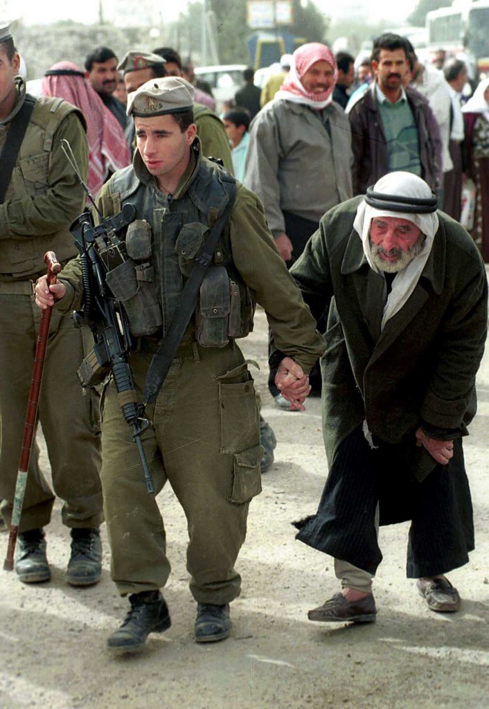 IDF Soldier and Arab man