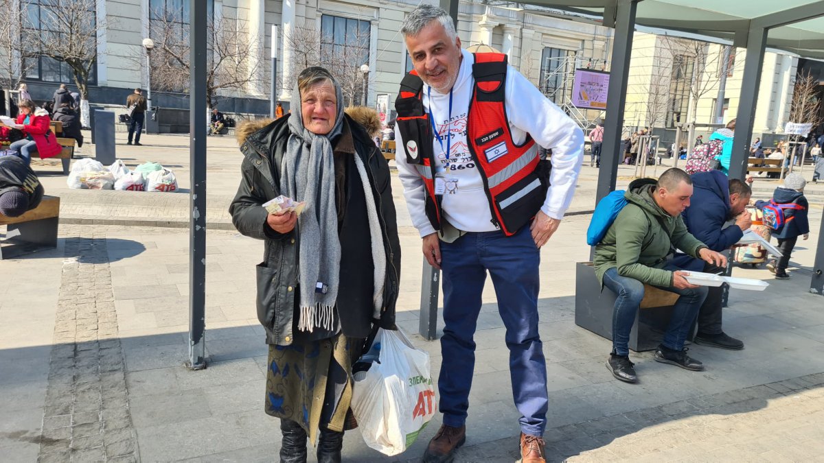 Shimon Sabag with elderly Ukrainian lady
