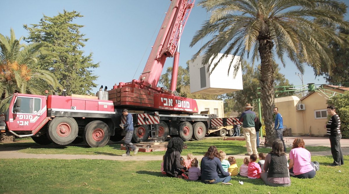 truck delivering bomb shelter