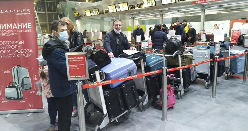 Russian Aliyah waiting to check in for flight