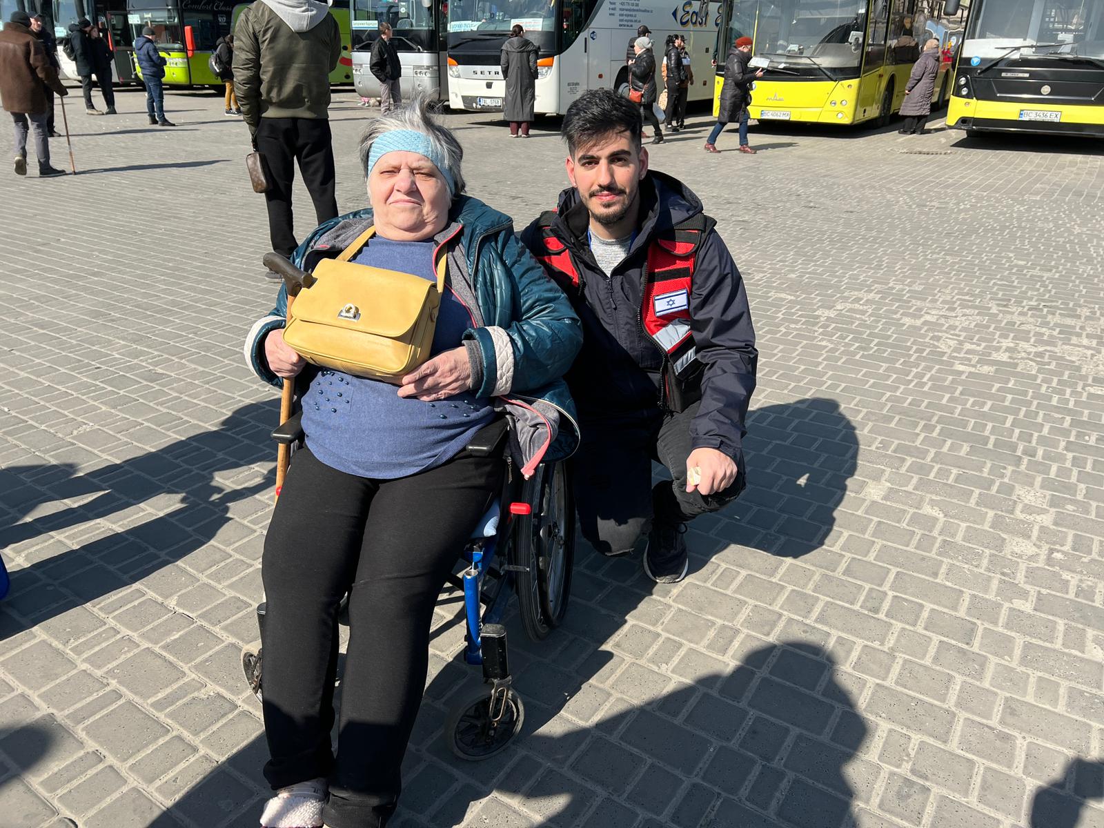 Holocaust survivor on wheelchair