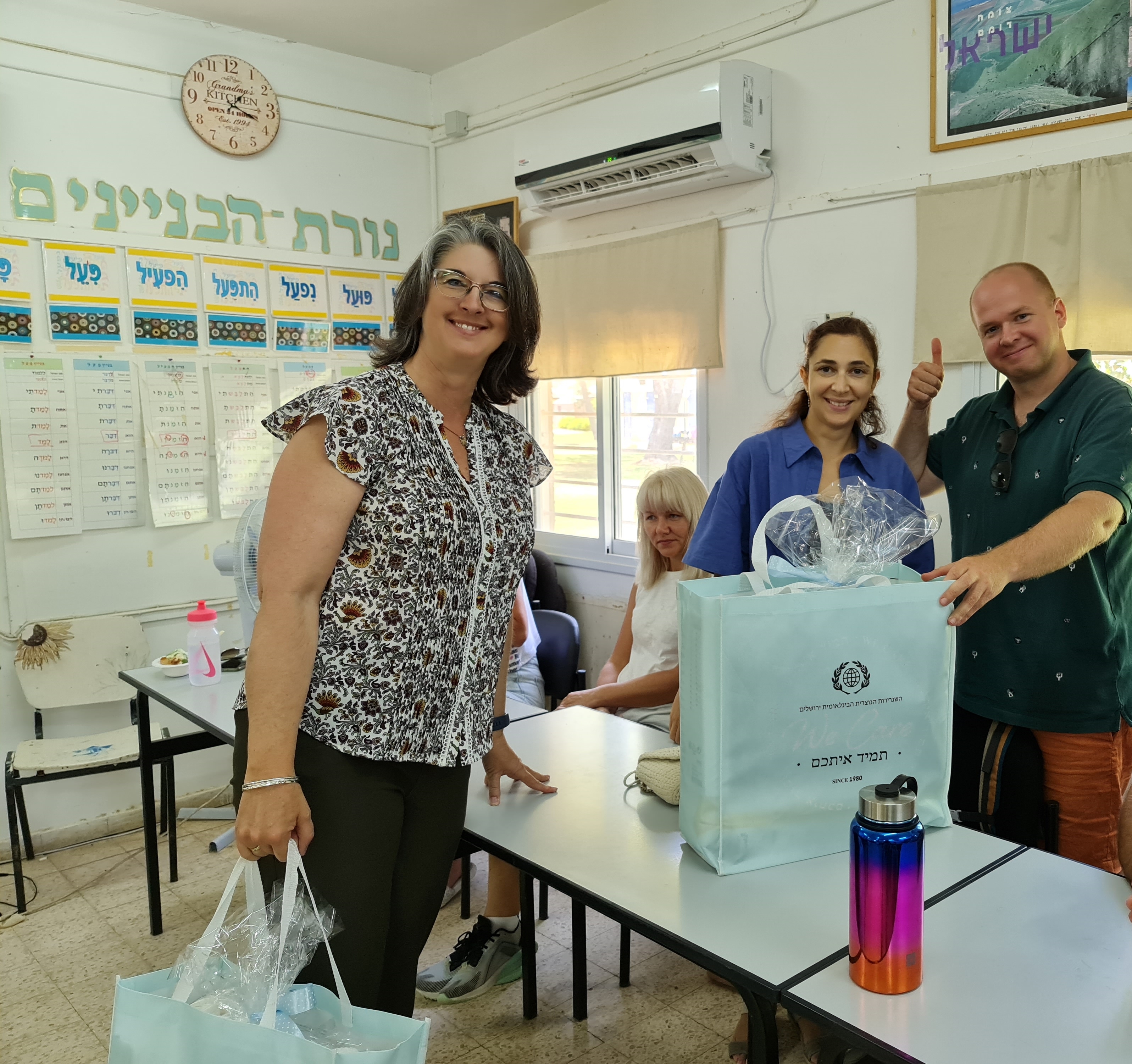 Nicole Yoder with immigrants