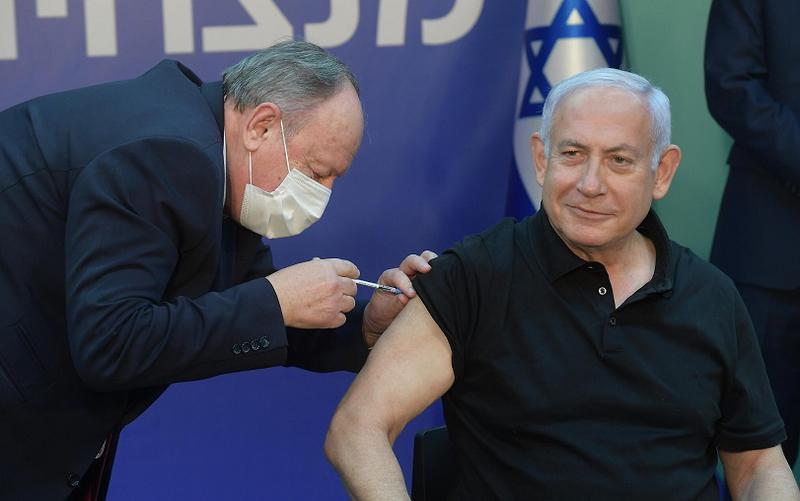 Bibi getting a vaccine
