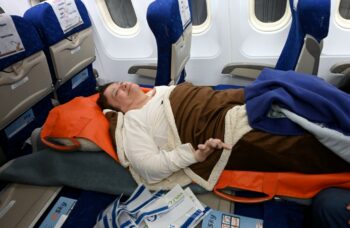 Frail elderly Jewish immigrant being evacuated from Ukraine