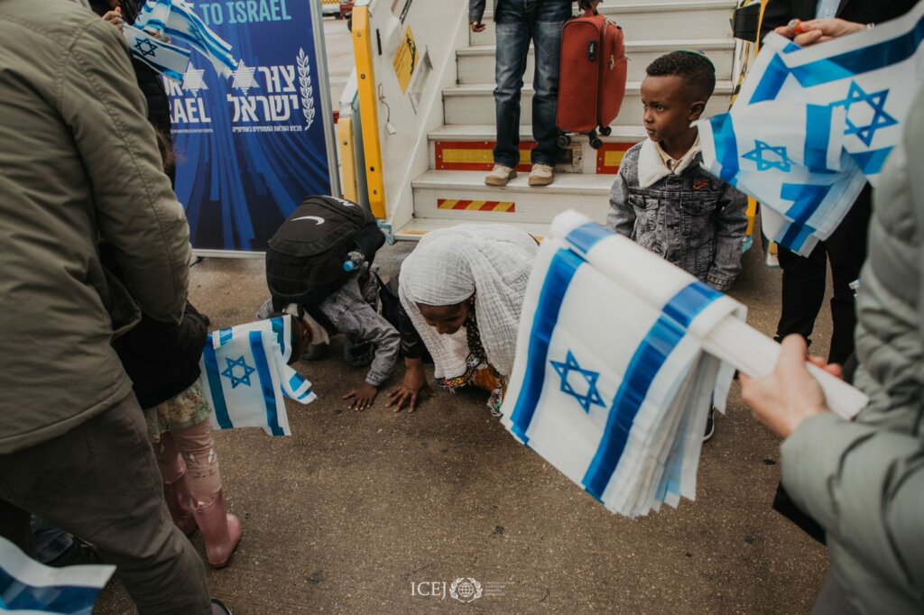 olim kissing the ground