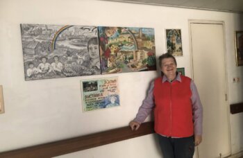 Tanya stands alongside her double painting.