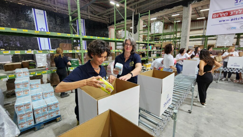 ICEJ staff packing food items