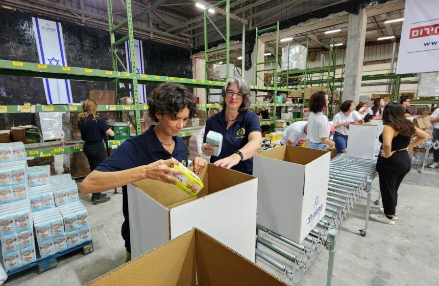 ICEJ staff packing food items