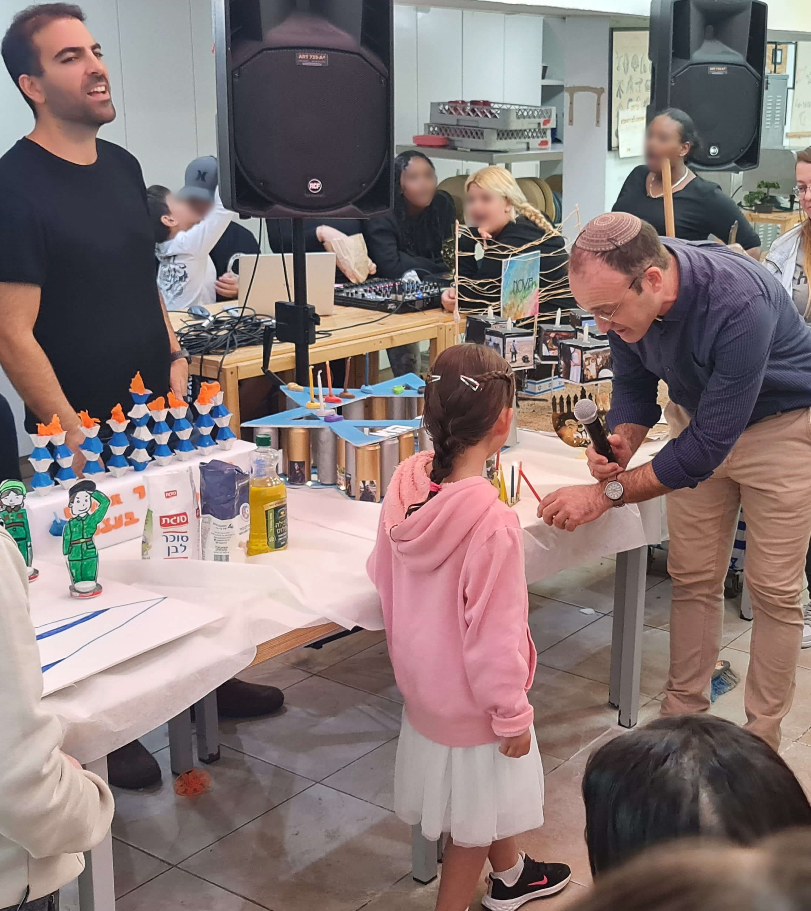 Rabbi prepares Menorah