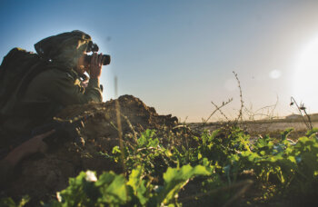 Soldier watches the landscape