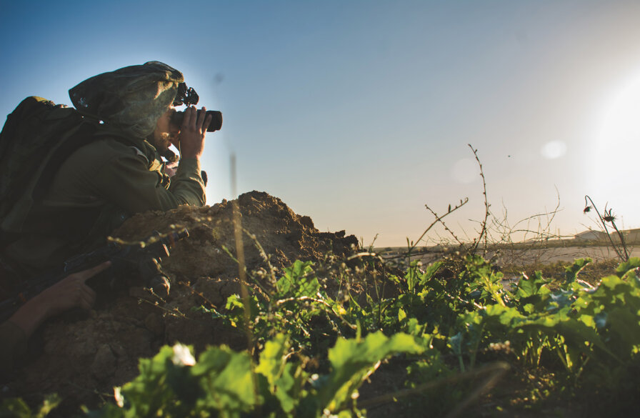 Soldier watches the landscape