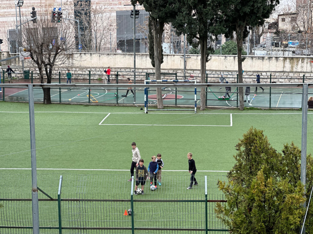 children playing soccer