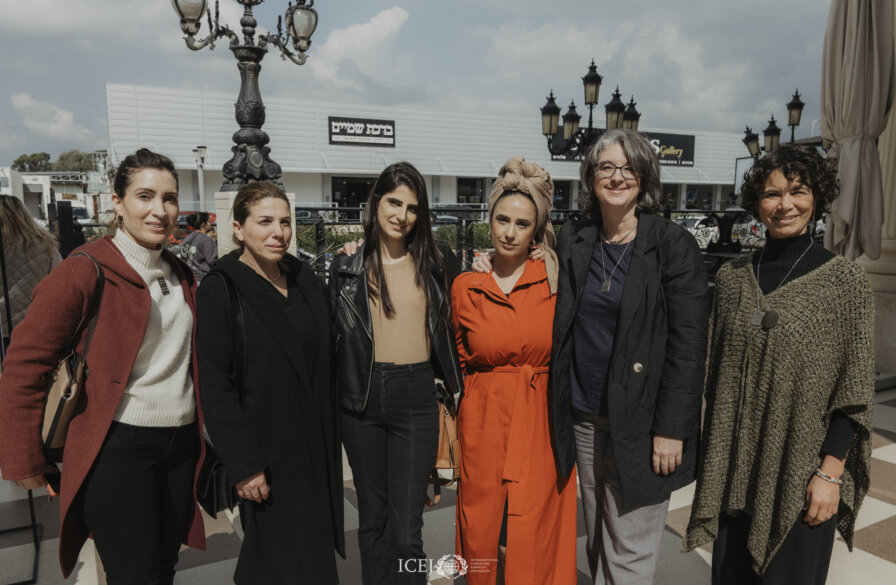 Nicole Yoder with Israeli evacuees who received special grants