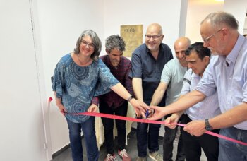 Leaders cutting the ribbon at the dedication ceremony