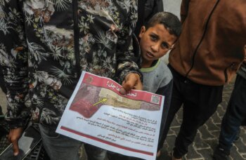 The Israeli army regularly drops leaflets in Gaza with warnings in Arabic for civilians. (Flash90/Abed Rahim Khatib)