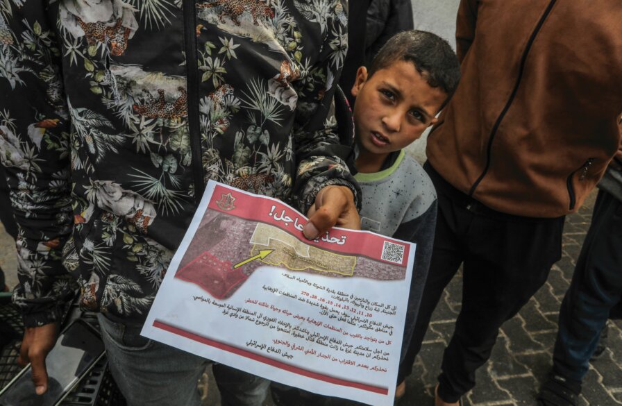 The Israeli army regularly drops leaflets in Gaza with warnings in Arabic for civilians. (Flash90/Abed Rahim Khatib)