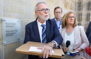 Jack van der Tang delivering the Decree to the International Court of Justice in the Peace Palace in The Hague