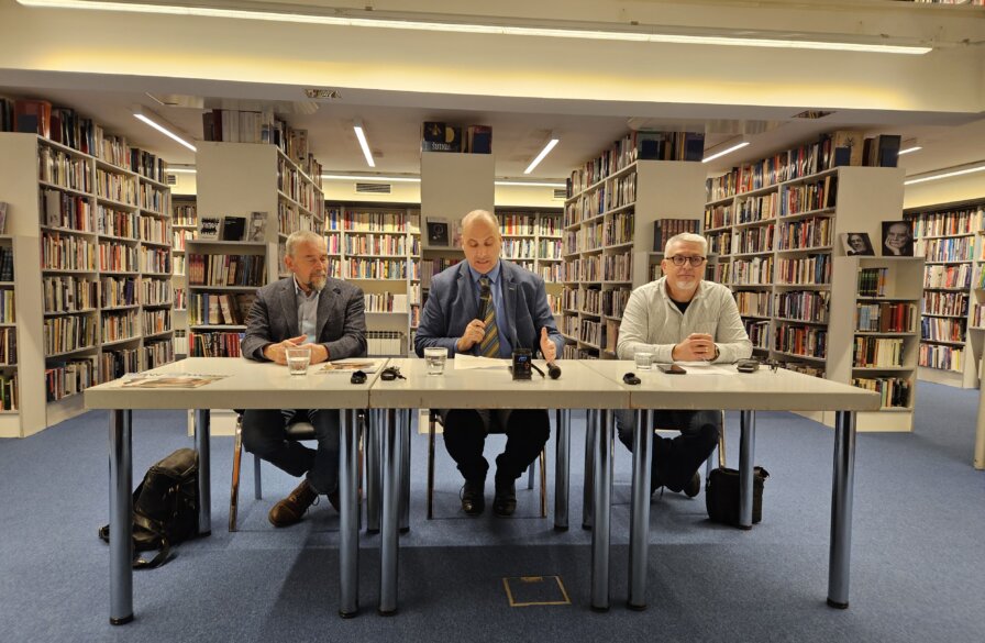 Mojmir Kallus (L to R), Vatroslav Župančić and Boris Havel in the public library. 