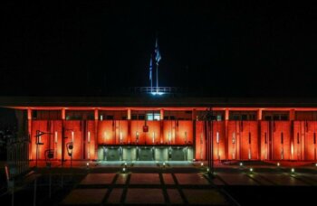 The Knesset is lit in orange on the eve of the Bibas funeral. (Credit: Knesset Spokesperson/GPO)