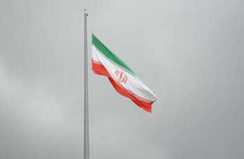 The flag of Iran. (Credit: Sina Drakhshani/Unsplash)