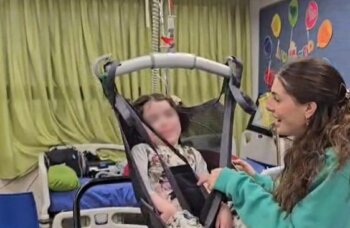 Disabled child in ICEJ Hoist