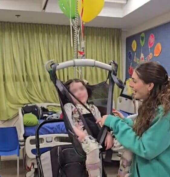 Disabled child in ICEJ Hoist