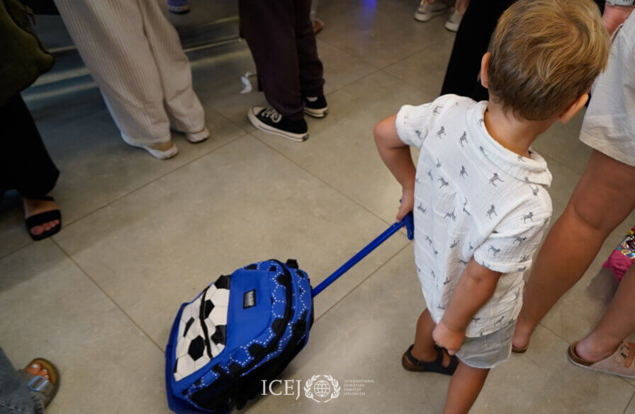 child walks with Backpack