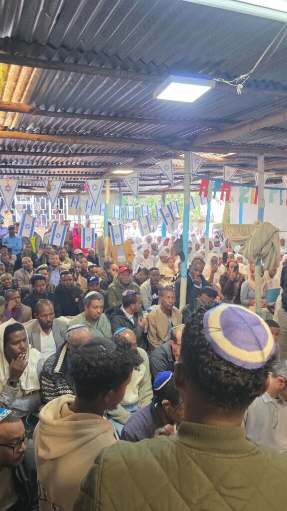 a group of several hundred Jews from the Tigray region listening to the Jewish Agency officials at the synagogue in Gondar. 