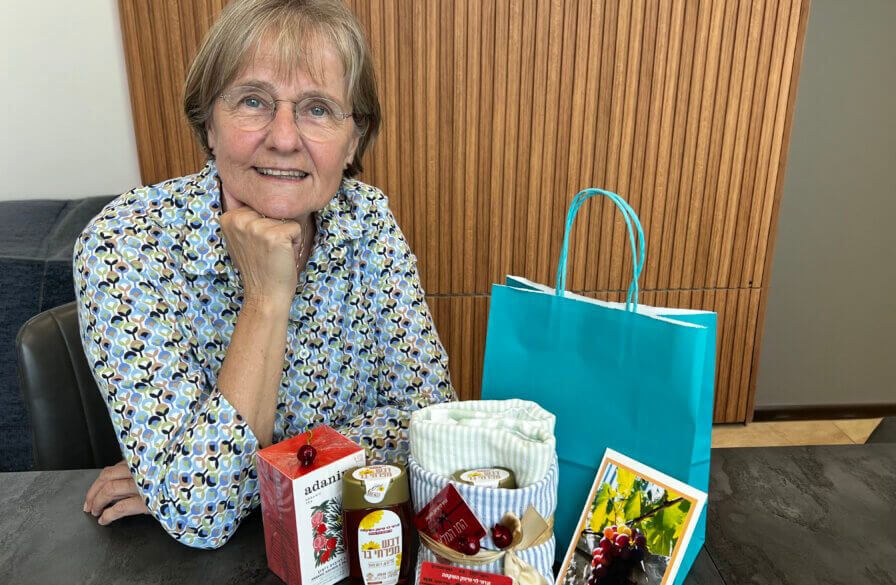 Corrie van Maanen with the Rosh HaShanah gifts
